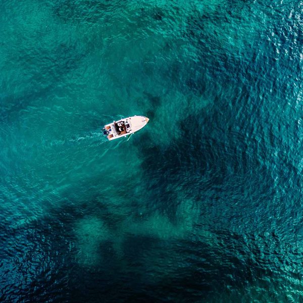 v2-aerial-view-of-speed-boat-and-blue-sea-in-croatia-2021-08-27-08-23-54-utc v2-aerial-view-of-speed-boat-and-blue-sea-in-croatia-2021-08-27-08-23-54-utc